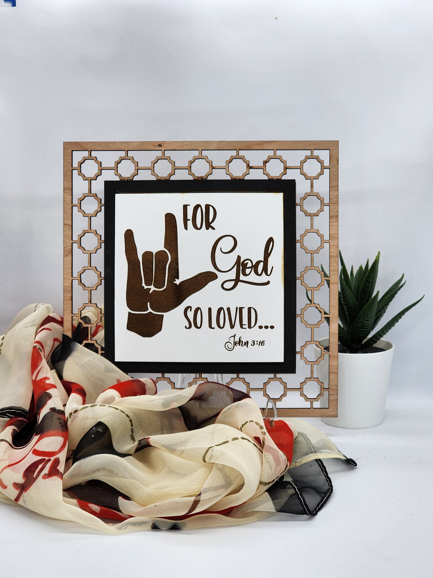 For God so Loved...John 3:16 with I Love You in sign language.  Sign measures 7 inches by 7 inches.  Verse insert is removeable so you can change it as you want. This is a wooden sign with an acrylic easel to hold the sign.