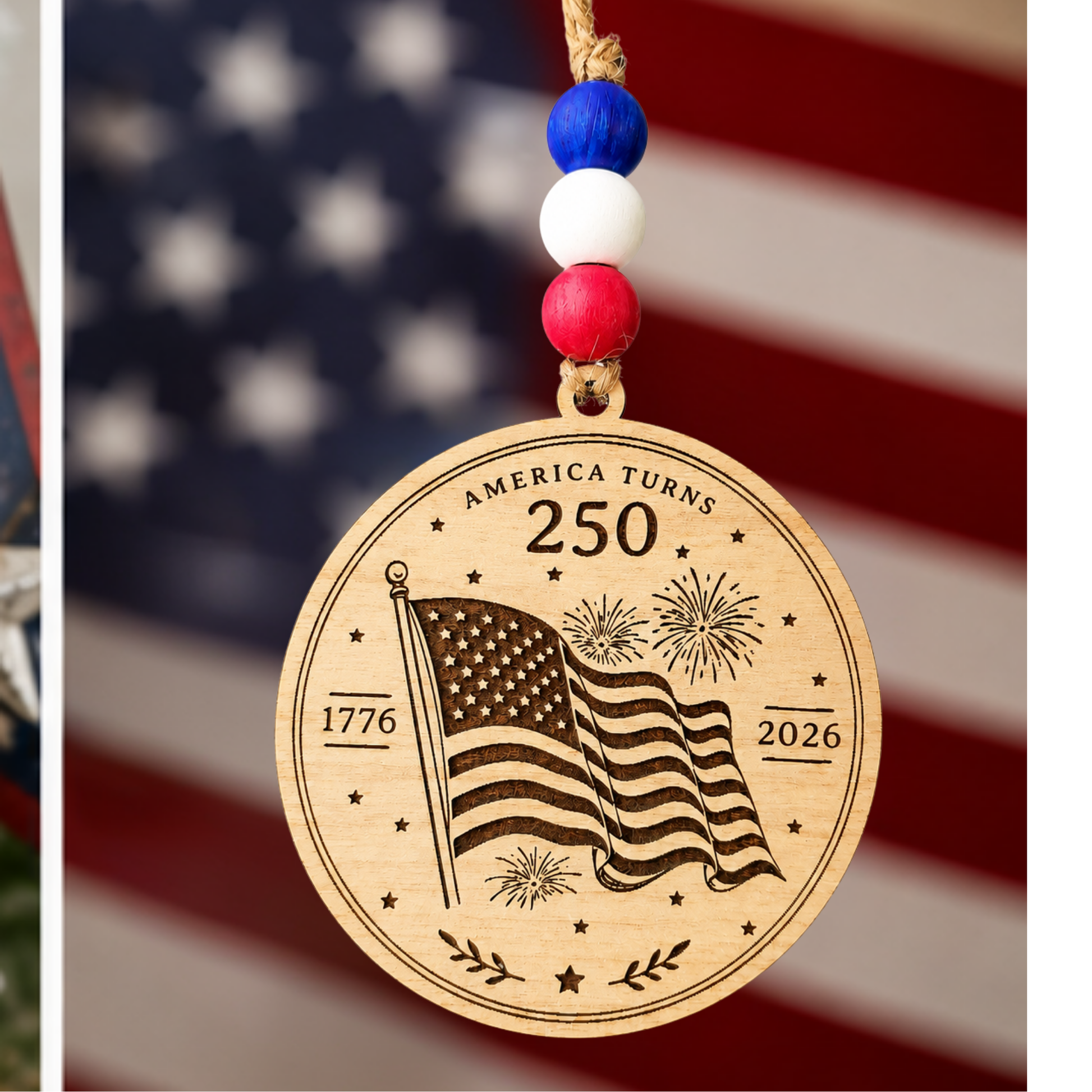Handcrafted wooden America 250 ornament featuring Flag. Laser engraved patriotic keepsake with red, white, and blue bead accents celebrating America's 250th anniversary.
